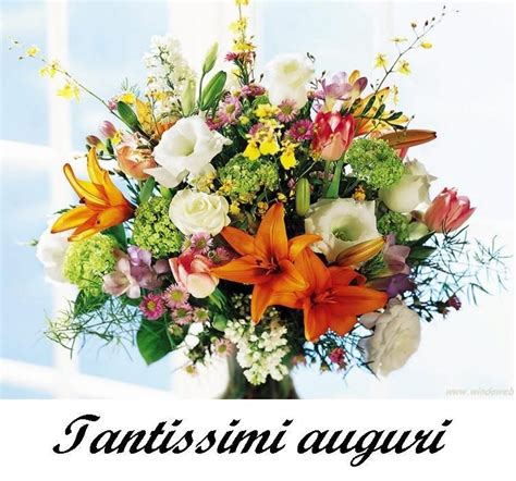 Biglietto di auguri con fiori e la scritta 