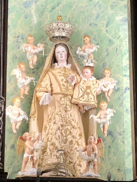 Dettaglio del quadro della Madonna degli Angeli: in alto lo Spirito Santo e figure celesti