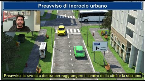 Foto generica di un incrocio urbano con veicoli e segnali stradali