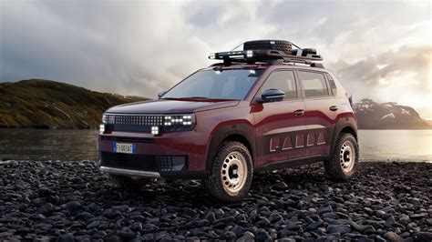 Thematic photo of a Fiat Panda 4x4 or Cross driving on a dirt road