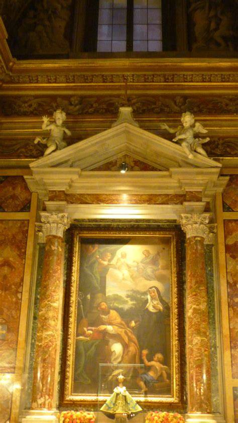 Affresco raffigurante Santa Rita con la famiglia