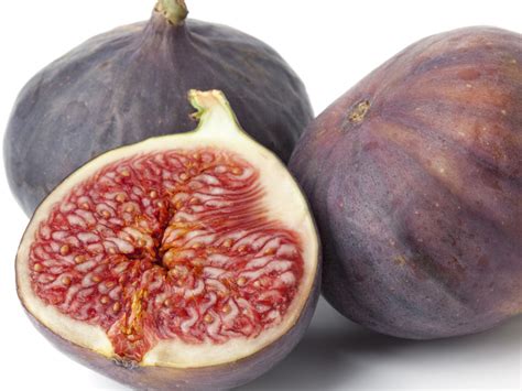 illustrazione di un frutto di fico nero e la sua sezione interna