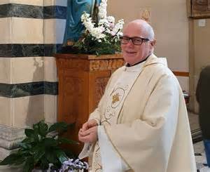 fotografia di don Carlo Brizzi sorridente