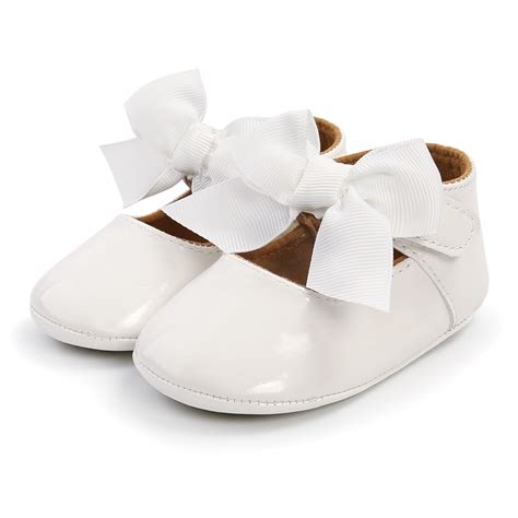 Scarpe culla da battesimo avorio per bambina con fiocco