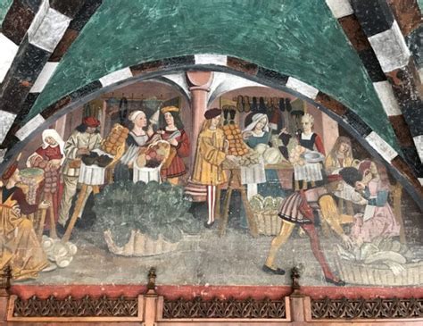 Affresco di una bottega artigiana nel porticato del Castello di Issogne