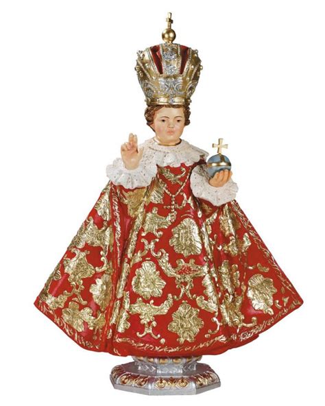Statua del Santo Bambino di Praga con abiti ricchi