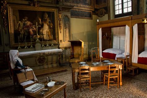 Rappresentazione di un ospedale medievale o di un'opera di carità.