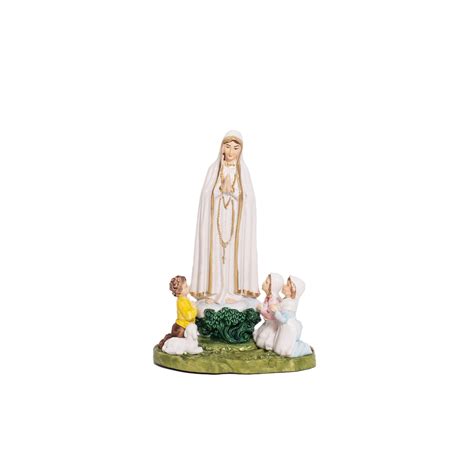 statua della Madonna di Fatima con i pastorelli