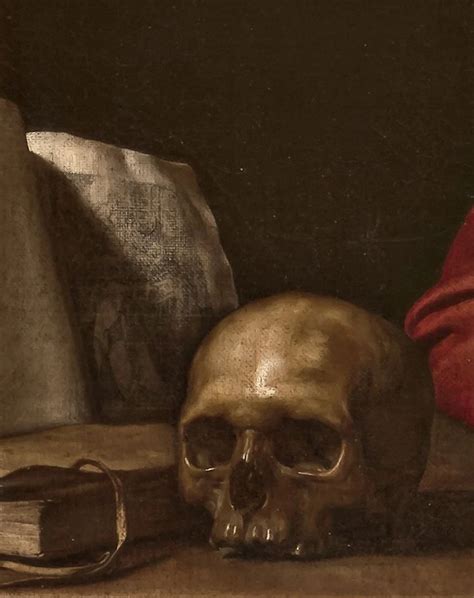 Dettaglio di un crocifisso con il teschio e le tibie incrociate ai piedi della croce.