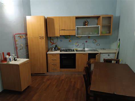 Interno dell'appartamento Casa Rosario ai Quartieri, mostrando le camere e la cucina