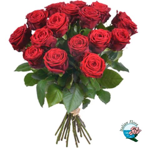 Un mazzo di rose rosse accanto a un'immagine della Madonna.