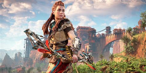 Aloy che esplora un paesaggio lussureggiante di Horizon Zero Dawn
