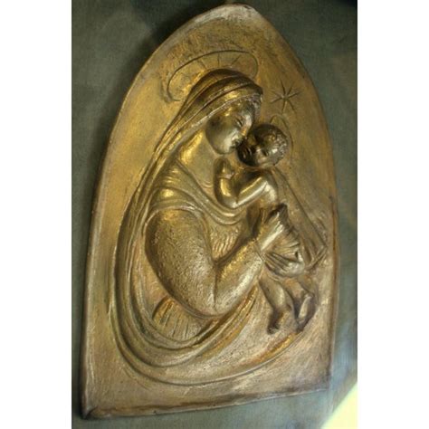 Scultura in bronzo della Madonna con Bambino